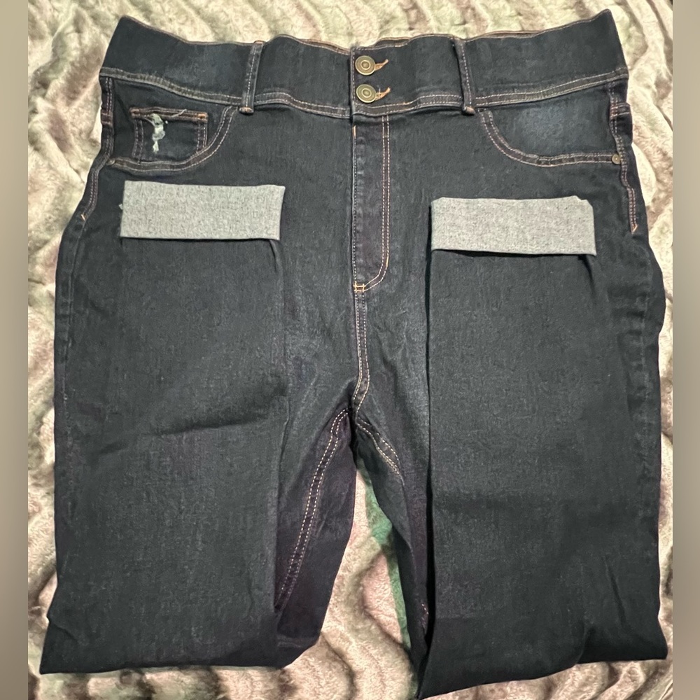 Long dark blue jeans with rips